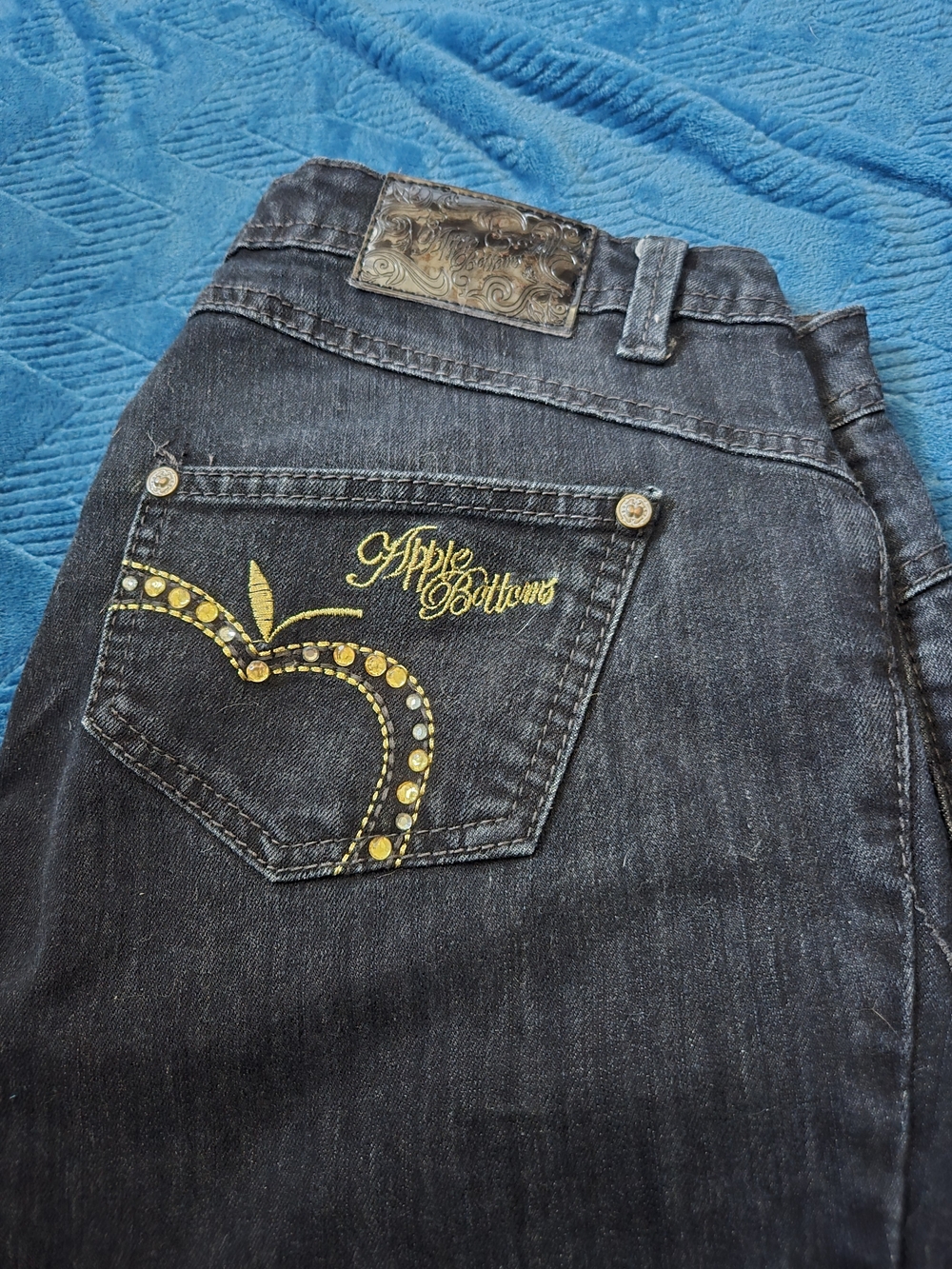 Apple Bottoms Black Jeans with Yellow Rhinestone Pocket Design